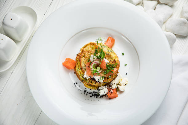 istock Pancakes with salmon, cheese, herbs 1256522041