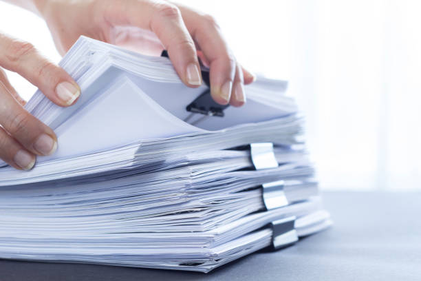 istock Stack of office paper documents. Business financial reports. 1256523460