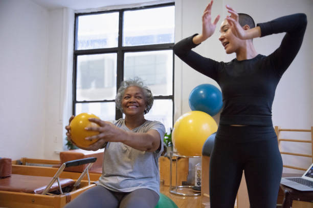 istock Senior african-american  woman doing exercise 1256523578