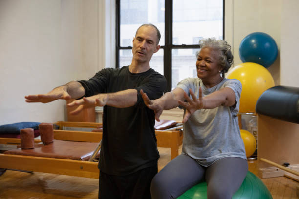 istock Senior african-american  woman doing exercise 1256523894