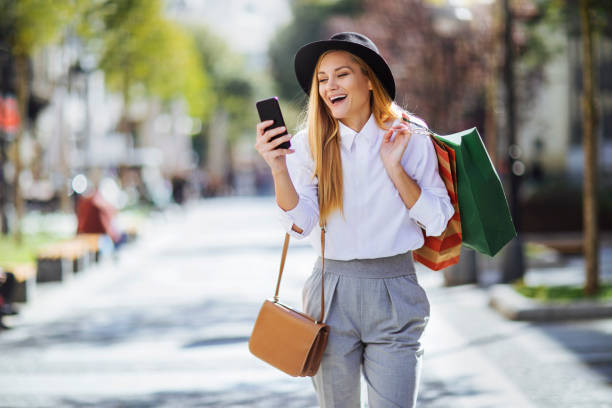 istock Blogging about the nice boutique she just found 1256524142