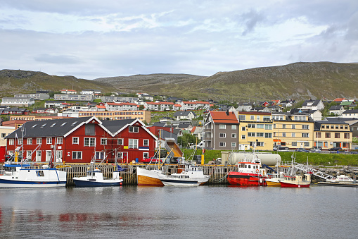 Town of Hammerfest with the port habour with fishing boats. Hammerfest is the northernmost town in the world with more than 10,000 inhabitants, county, Norway.