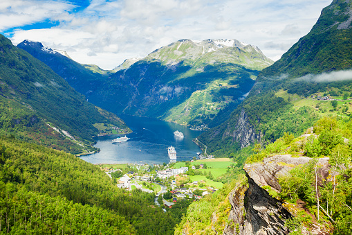 Geirangerfjord and Geiranger village aerial view from Flydalsjuvet viewpoint, Norway