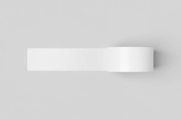 istock White unrolled duct tape mockup on a grey background. 1256536136