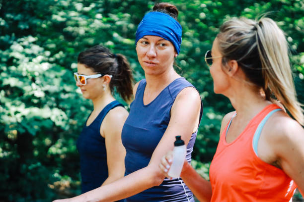 istock Group of female runners in the forest 1256538355