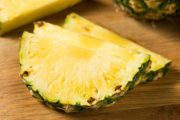 istock Raw Yellow Organic PIneapple Slices 1256543779
