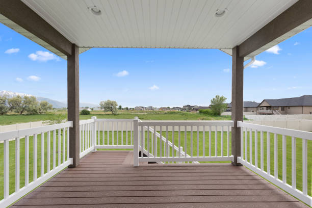 istock Covered patio and deck of new home 1256544579
