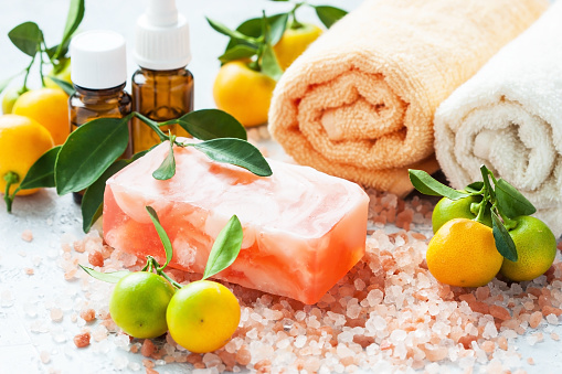 Aromatic spa set with soap and towels. Spa treatments and skin care concept