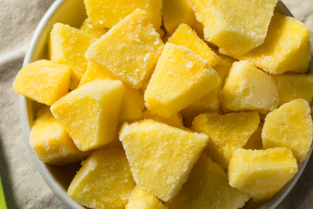 istock Yellow Organic Frozen Pineapple 1256546936