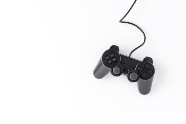Overhead shot of video game controller isolated on white background with copyspace