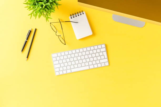 istock Office desktop with computer and business accessories. Modern workspace. Top view 1256548156
