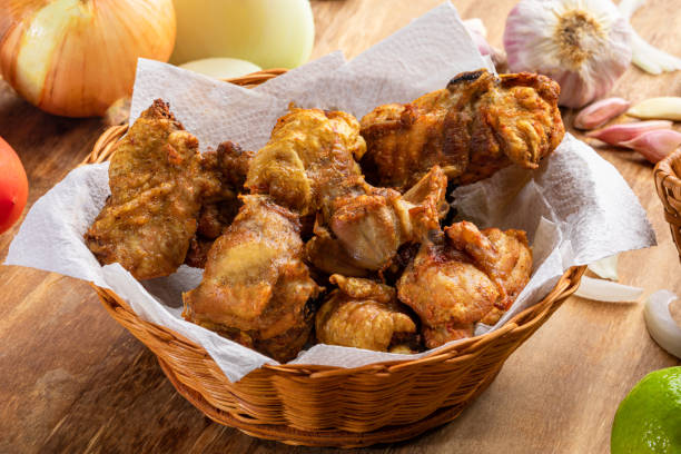Brazilian style deep fried chicken. Called chicken to bird Brazilian style deep fried chicken. Called frango a passarinho. nub stock pictures, royalty-free photos & images
