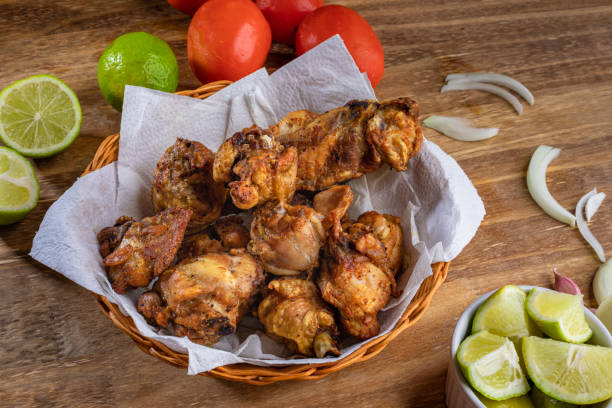 Brazilian style deep fried chicken. Called chicken to bird. Top view Brazilian style deep fried chicken. Called frango a passarinho. Top view. nub stock pictures, royalty-free photos & images