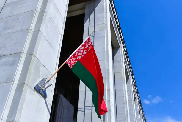 Photo of Large Belarusian flag on the wall of the Palace of Independence