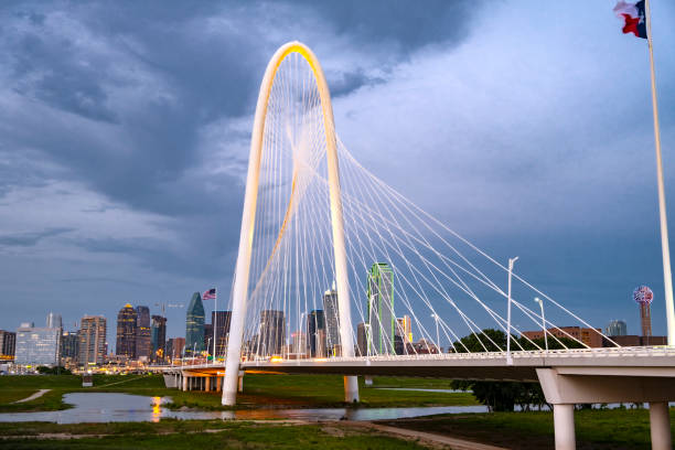 istock Dallas Texas skyline and storm cloud at twilight 1256553570