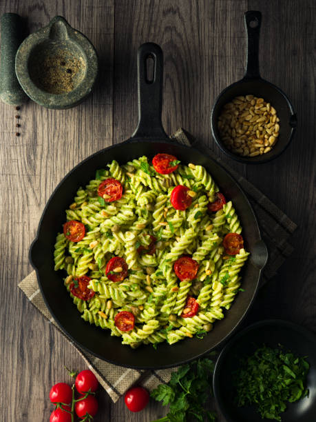 healthy fusilli pasta with vegan broccoli pesto sauce - pasta directly above fusilli food imagens e fotografias de stock