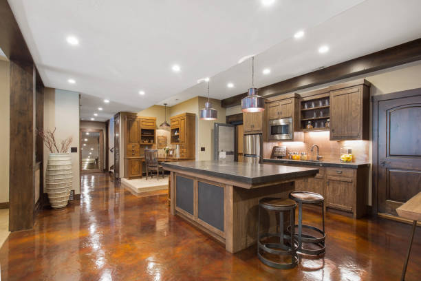 Second kitchen in basement Showcase home with glossy basement flooring and large kitchen bar stool photos stock pictures, royalty-free photos & images