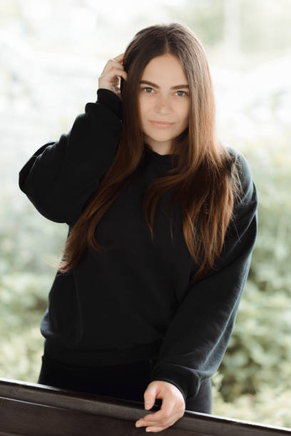 istock Young Girl with Long Flying Hair, on light Background 1256558559