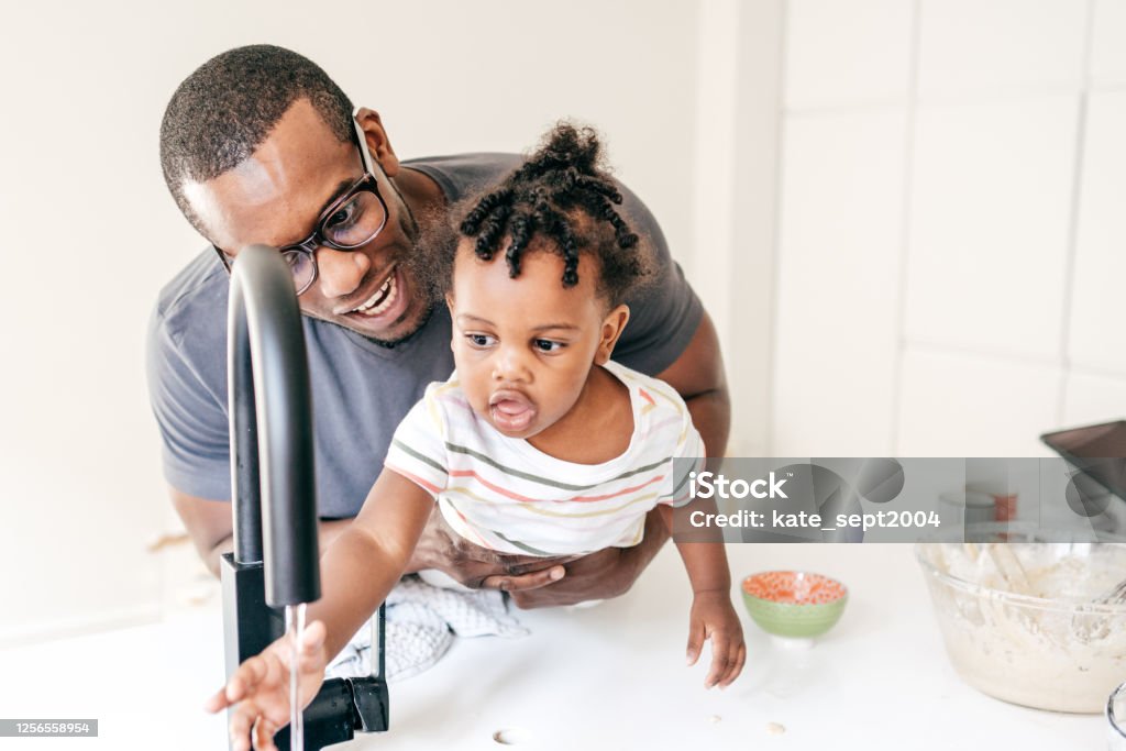 baby Washing hand together with dad Baby routine 30-34 Years Stock Photo