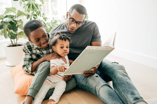 istock Reading with kids and  keeping they away from screens 1256558961