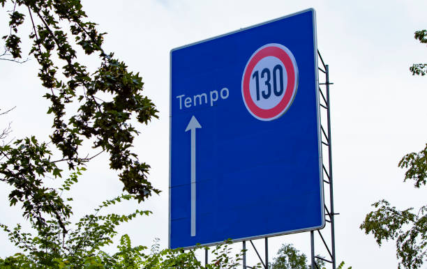 istock german highway direction sign, changed to speed limit 130 advice 1256563134