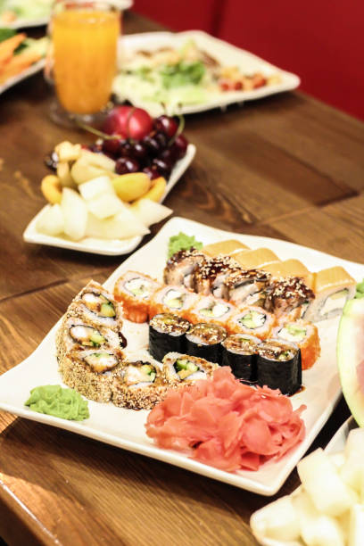 istock Rolls in the restaurant. Rolls with wasabi and pickled ginger. 1256570505