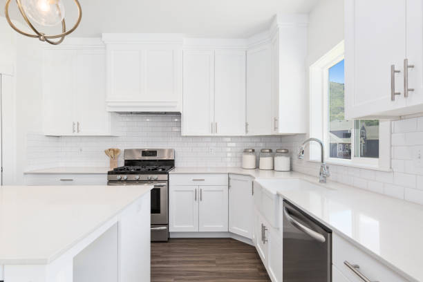 istock White gourmet kitchen with farmhouse sink 1256572674