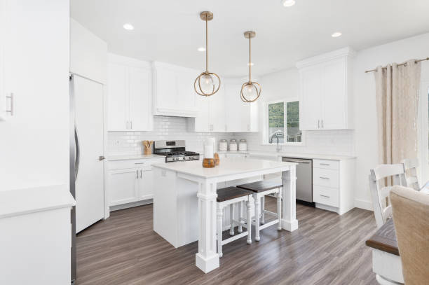 White gourmet kitchen with farmhouse sink