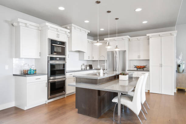 istock Spectacular gourmet kitchen with white cabinets 1256575625