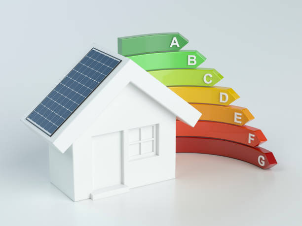istock 3D small house with solar panels and energy efficiency 1256578681