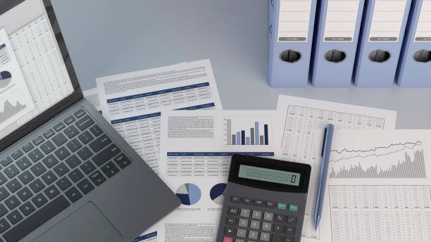 istock Accounting, laptop, pen and calculator 1256578839