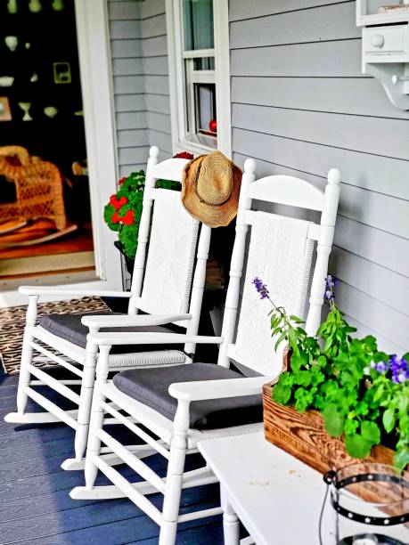 istock Two  Rocking chairs on a porch 1256581287