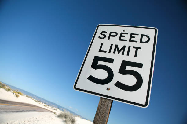 Speed Limit 55 Speed limit sign near White Sands, New Mexico. speed limit sign stock pictures, royalty-free photos & images