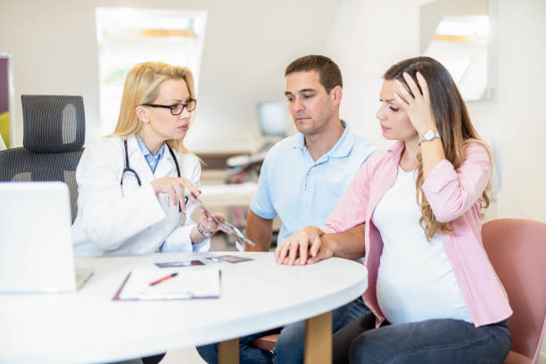 istock Worried young couple on a pregnancy exam. 1256586368