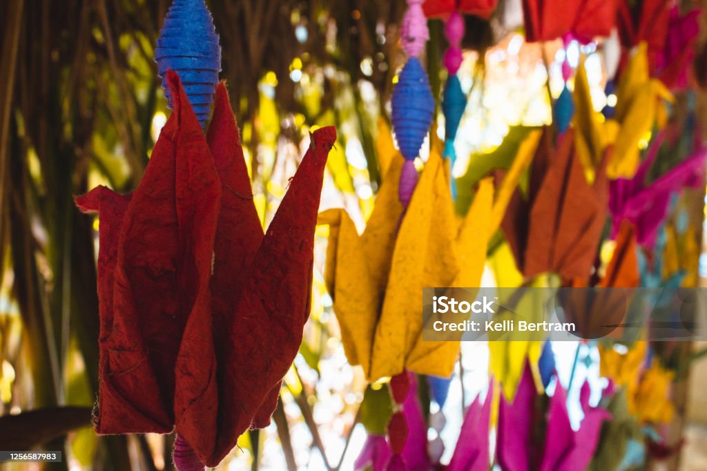 Paper Swans different colored paper swans hanging for a ceiling Colors Stock Photo