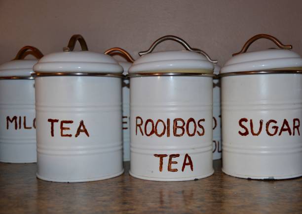 istock White tin kitchen containers for holding tea, coffee, sugar and rooibos speciality tea 1256588982