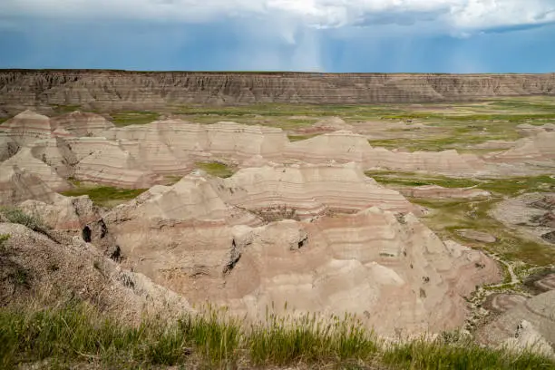 Photo of Big Badlands Overlook in Badlands National Park, as a thunderstorm rolls in