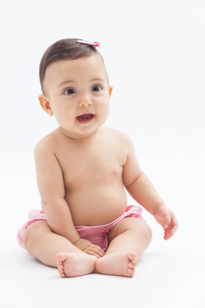 istock baby expressing surprise on a white background. 1256594850
