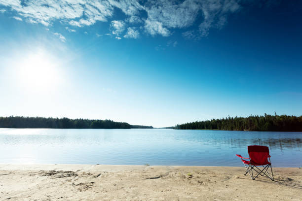 Black lake is a hidden Gem,  Part of Nopiming Provincial Park, Manitoba , Canada.  Two hour drive NE of Winnipeg.  Low morning light,  Image taken from a tripod.