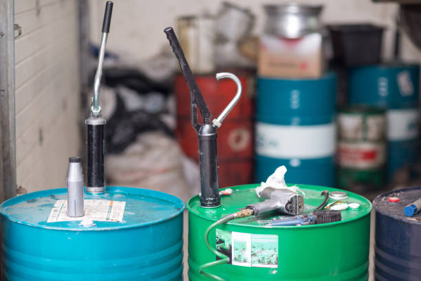 istock Service station. Oil Barrel for car engine. 1256599577
