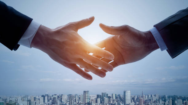 istock Partnership of business concept. Shaking hands. 1256603000