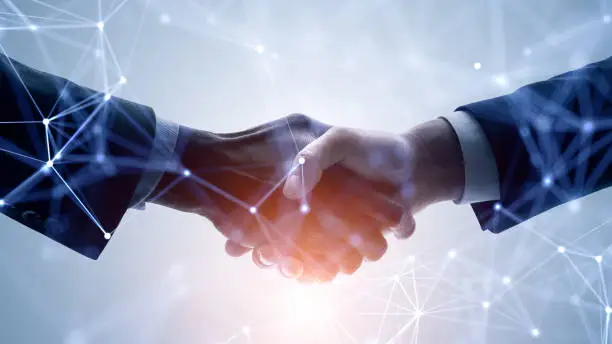 Photo of Business network concept. Customer support. Shaking hands.