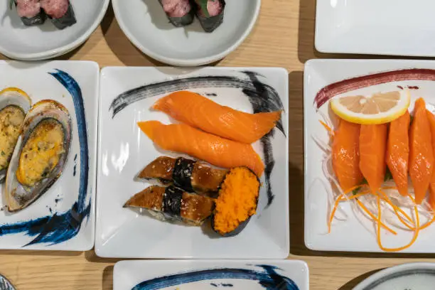 salmon sashimi and sushi, japanese style food
