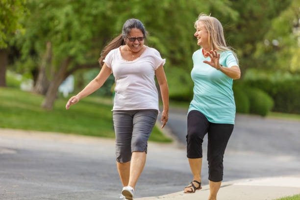 istock Two Senior Female Friends Enjoying Spending Time Together 1256608461