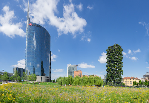 Milano, Italy. The iconic Unicredit tower and the Bosco Verticale. Skyscrapers which is part of a group of residential and business buildings. Modern and ecological buildings