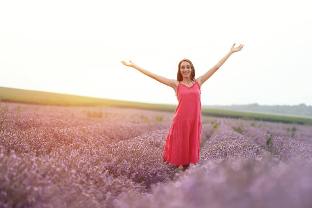 istock Young girl in lavender field 1256616076
