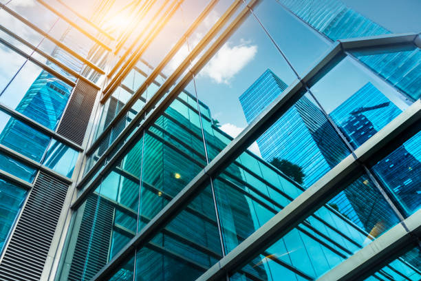 istock Urban abstract - windowed corner of office building 1256617870