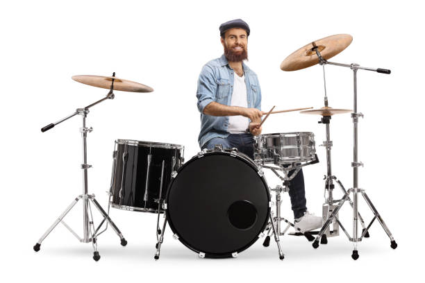 Bearded musician playing a set of drums