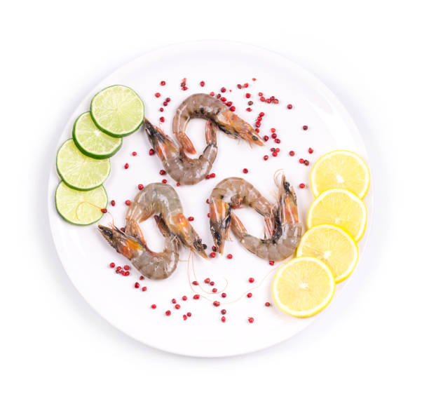 istock Raw tiger shrimps on a plate. 1256627639