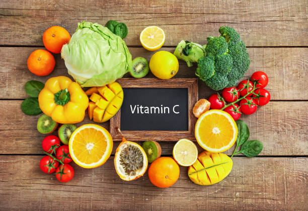 high vitamin c sources assortment - vitamin a letter a food orange imagens e fotografias de stock